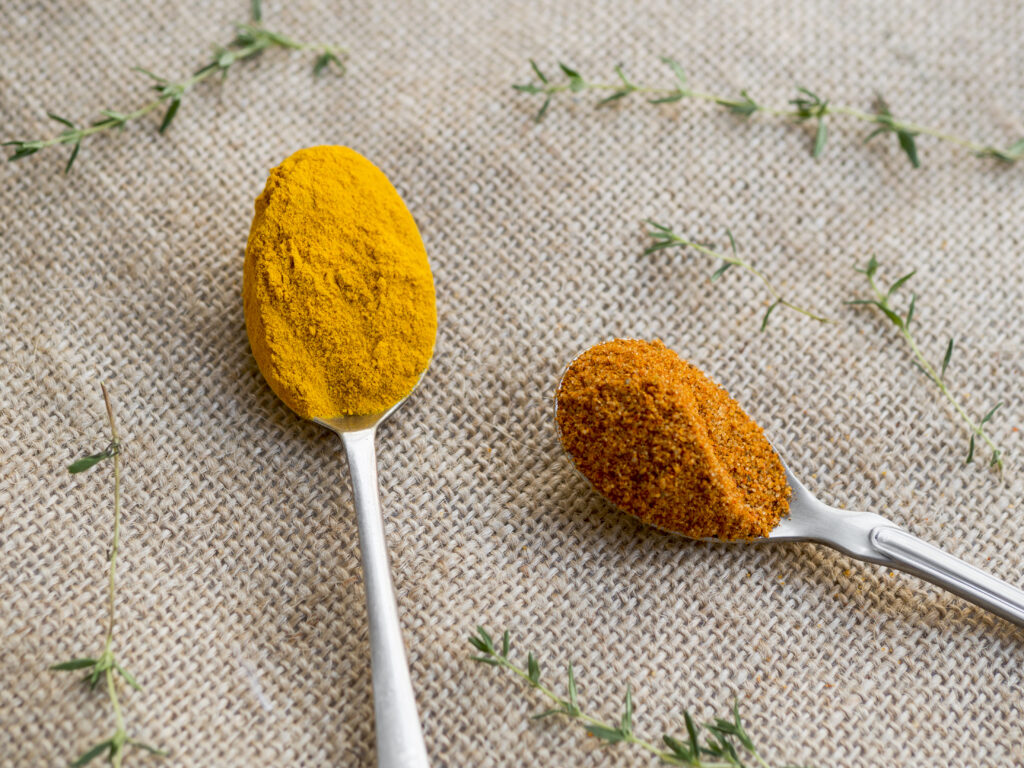 Turmeric paste being applied to skin